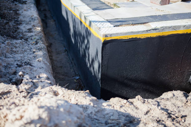 Professional Basement Waterproofing technician working in Jacksonville, OH